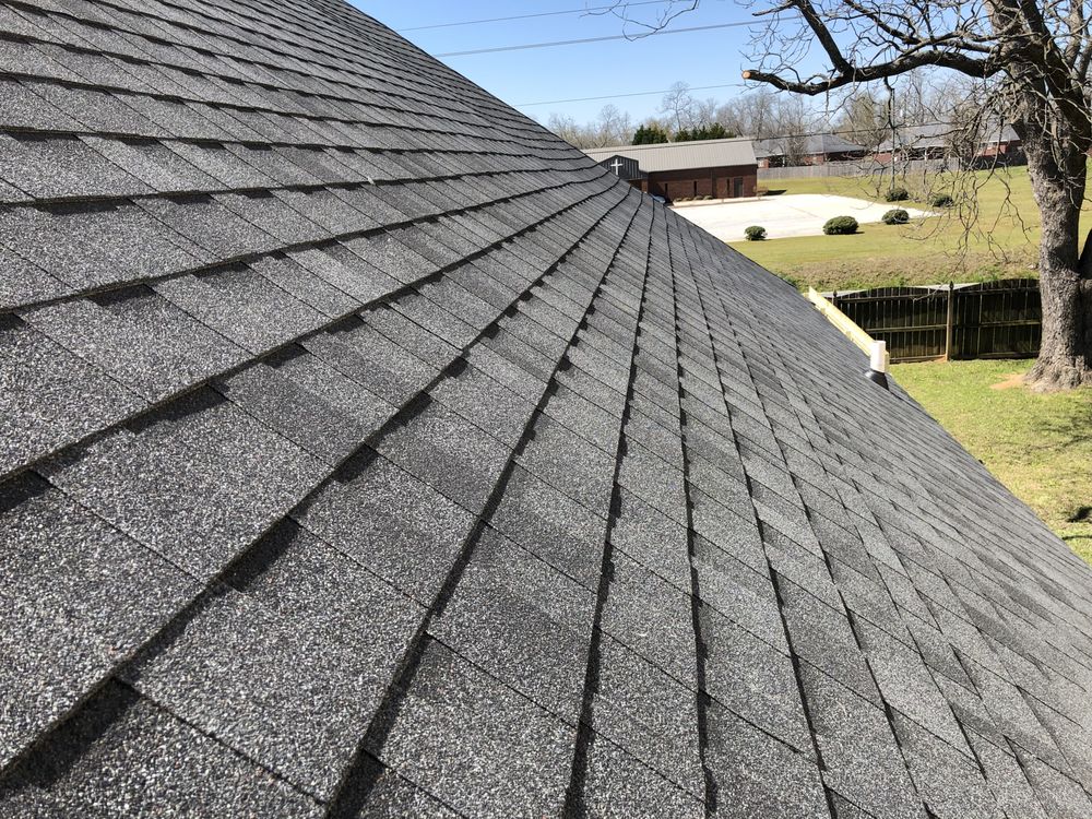 Slide of Woodward Roofing