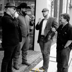 Gentry Barber Shop - Enjoying a Cigar at Gentry Proper Barbershop