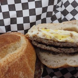 a sausage sandwich with egg a sausage sandwich with egg