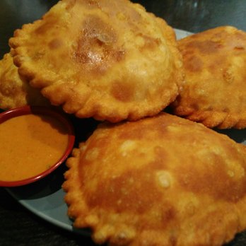 Himalayan Kitchen - Sha Bhaley: it's a Tibetan patty. (or meat pie) filled with beef. Tasty but I didn't like the sauce that came with it. - Indian Near Me - Toronto, Ontario