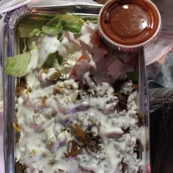 Three Pyramids Halal Cart - Delicious $6. But no pita. Better than the one in front of Citibank.