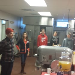 FEED Kitchens - Mandy Shipler, of Mandy's Mood Foods, and Master Yelper Corey D., talking to assembled Yelpers about her Madison business.