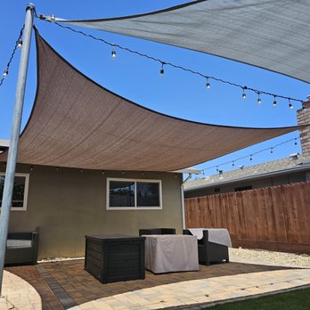 Extreme Handyman Services - Large square shade sail over patio - Handyman Near Me Extreme Handyman Services - Large square shade sail over patio - Handyman Near Me