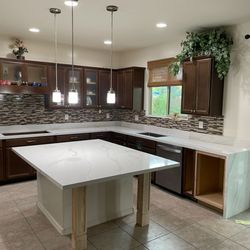 All Elite Stone - Luxury home Chandler arizona quartz countertops install waterfall legs book match