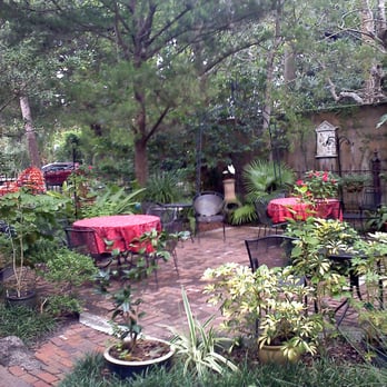 St. Francis Inn - The beautiful courtyard. There are candles and string lights at night. - Bed & Breakfast Near Me - St Augustine, Florida St. Francis Inn - The beautiful courtyard. There are candles and string lights at night. - Bed & Breakfast Near Me - St Augustine, Florida
