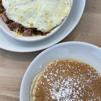 Eggsquisite Cafe - My hubby's skillet breakfast with a side of very fluffy yummy pancakes, best we have had in a long time. - Breakfast & Brunch Near Me - Fort Worth, Texas