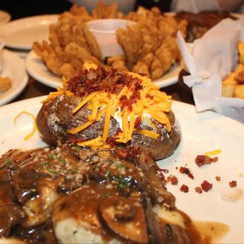 Texas Roadhouse - a plate of food on a table - American Near Me - Bismarck, North Dakota