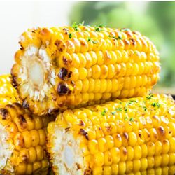 Lennox Wings - Seasoned Corn on the Cob.  With a little burnt to it. So Delicious. You'll definitely need some floss after devouring this Corn