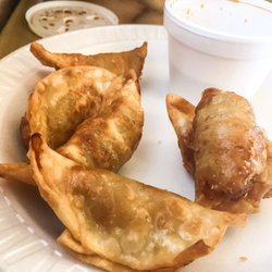 Lotus Express - Fried pot stickers with dipping sauce.