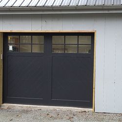 Raynor Overhead Door Sales - Our Rock Creeke in Black with insulated three over three windows