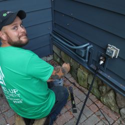 Level Up Improvement - Brandon doing finishing touches (co-owner)
