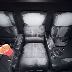 Bright Star Cinemas - They need to take the sign down in the front of the building saying luxury seating because that's a big lie