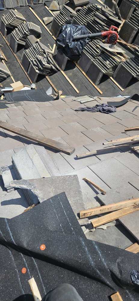 Slide of Femat Roofing