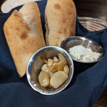 Pelican's West - Bread with butter and roasted garlic - Seafood Near Me - Albuquerque, New Mexico