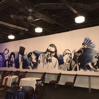 Forte Jazz Lounge - The fabulous mural of jazz legends done by Charleston School of the Arts students!  Also, see the general seating chairs along the wall. - Lounges Near Me - Charleston, South Carolina