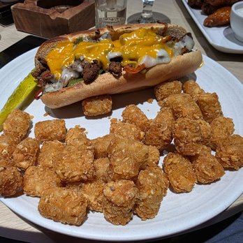 Red Falcon - Steak sandwich with tots - Smokehouse Near Me - Coachella, California
