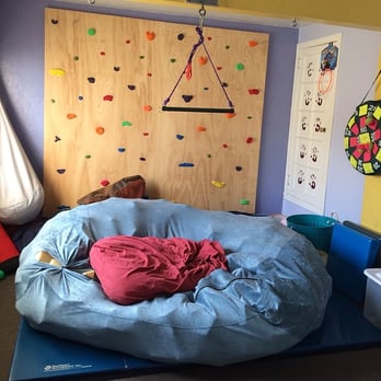 Coastside Pediatric Therapy Center - Maureen Barton's amazing OT gym; be a trapeze artist or climb the rock wall! - Occupational Therapy Near Me - Half Moon Bay, California Coastside Pediatric Therapy Center - Maureen Barton's amazing OT gym; be a trapeze artist or climb the rock wall! - Occupational Therapy Near Me - Half Moon Bay, California