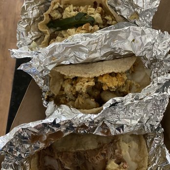 7taco - (From above to below): jalapeno, chorizo, beans (all with egg and cheese).  Cause Texas! - Tacos Near Me - Houston, Texas