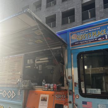 Gussy's - a food truck parked in front of a building - Food Trucks Near Me