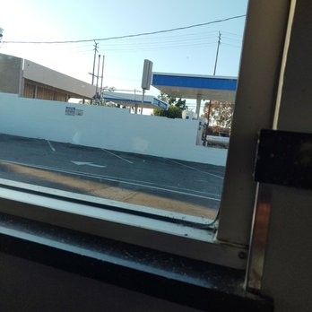Fantastic Burgers - Dirty windows w spider webs w dead bugs. - American Near Me - Long Beach, California Fantastic Burgers - Dirty windows w spider webs w dead bugs. - American Near Me - Long Beach, California