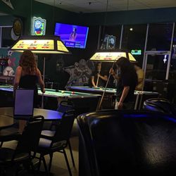 The Billiard Den - $1.50 pool tables