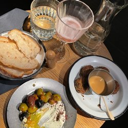NENI - Sourdough bread, goat cheese & olives, popcorn falafel bites.