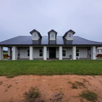 Rust Painting - New construction home exterior. - Painters Near Me