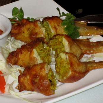 Phnom Penh House - Fried chicken wings, stuffed with bean thread/meat/mushrooms: Slaap Moarn Borg. OK, but a little too bland. - Cambodian Near Me - Alameda, California Phnom Penh House - Fried chicken wings, stuffed with bean thread/meat/mushrooms: Slaap Moarn Borg. OK, but a little too bland. - Cambodian Near Me - Alameda, California