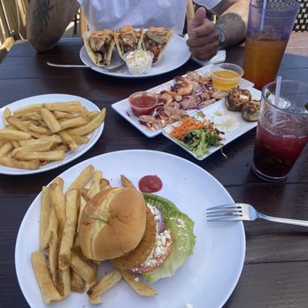 Pier 16 - Fried green tomato sandwich, fresh local shrimp, fresh caught mahi-mahi tacos, stuffed mushrooms, blueberry & strawberry mocktail. - Cocktail Bars Near Me - Tybee Island, Georgia