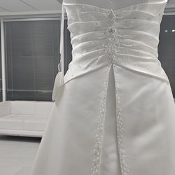 Judith's Boutique and Alteration - Satin, low sweetheart neck, Ivory, size 10 only one left. Chapel train