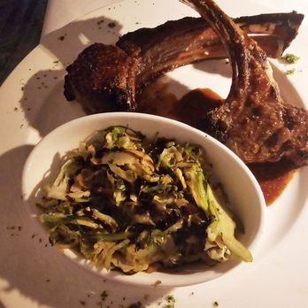 Epic Chophouse - Double cut rack of lamb with sautéed shaved brussel spouts - Seafood Near Me - Greensboro, North Carolina Epic Chophouse - Double cut rack of lamb with sautéed shaved brussel spouts - Seafood Near Me - Greensboro, North Carolina