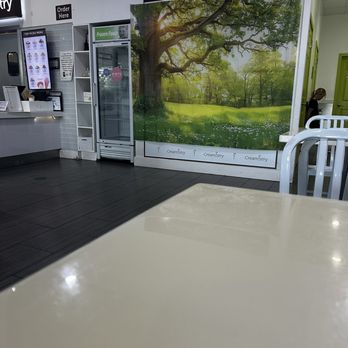 Creamistry - Cooler of some sort? Empty. Maybe broken. Covered with a banner - Ice Cream & Frozen Yogurt Near Me - Katy, Texas