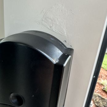 Locktight Impact - Tried to cover up damage to door - Windows Installation Near Me - Fort Lauderdale, Florida