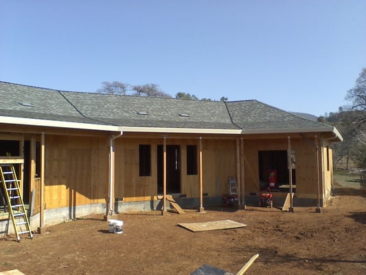 R Mcguire Roofing Co Logo