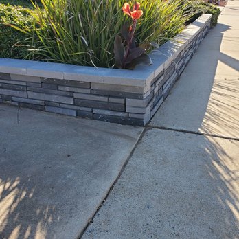 Sierra Landscape - Corner driveway retaining wall. - Landscaping Near Me Sierra Landscape - Corner driveway retaining wall. - Landscaping Near Me