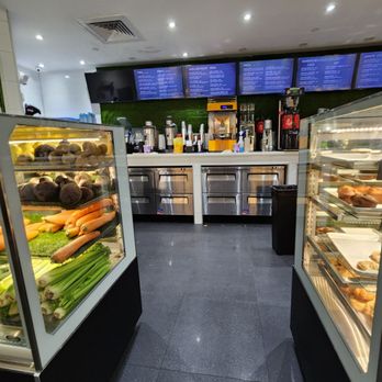 C'est Bon - a display case of food in a restaurant - Coffee & Tea Near Me - Coral Gables, Florida