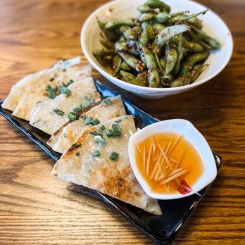 Duck n Bao - Crispy Scallion Pancake and Spicy Garlic Edamame - Szechuan Near Me - Cypress, Texas Duck n Bao - Crispy Scallion Pancake and Spicy Garlic Edamame - Szechuan Near Me - Cypress, Texas