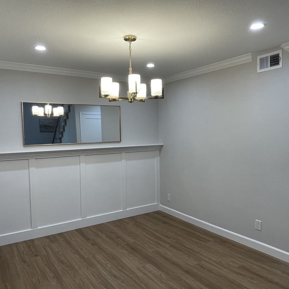 EHR - Dining room finished with baseboards, crown moulding and accent wall thanks to Eddie and Michael - Flooring Near Me