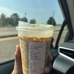 Starbucks - An improperly made Iced Shaken Espresso. Beverage looks like an iced latte with light ice. August 2025