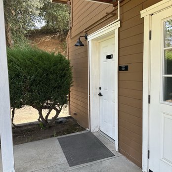 Purple Owl Cafe - Bathroom to the left of the building close to the Main Street under the staircases - Creperies Near Me - Julian, California