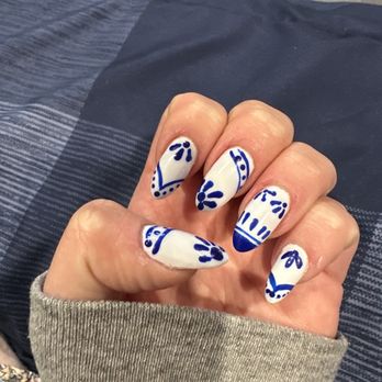 Paint Nails & Spa - Acrylic tips with white base and blue design. Design reference from Pinterest ( https://pin.it/6u30q24 ) - Massage Near Me - Garden City Park, New York Paint Nails & Spa - Acrylic tips with white base and blue design. Design reference from Pinterest ( https://pin.it/6u30q24 ) - Massage Near Me - Garden City Park, New York