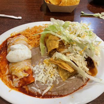 Amigo's - Combo plate with chicken enchilada, ground beef taco and rice and refried beans - Mexican Near Me - Kahului, Hawaii