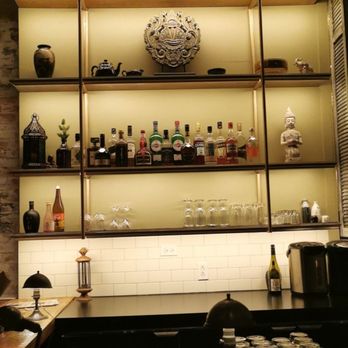 Sesame - a bar with a clock on the wall - Asian Fusion Near Me - Montreal, Quebec Sesame - a bar with a clock on the wall - Asian Fusion Near Me - Montreal, Quebec