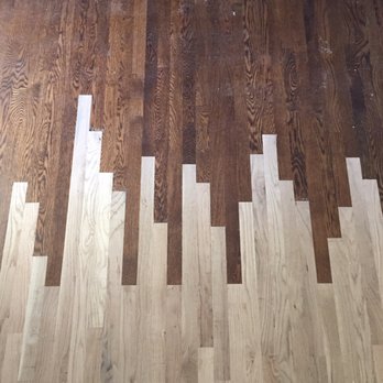 Floorcraft - Lacing new wood into existing wood. It was then sanded and stained to match the wood they installed two years earlier. - Flooring Near Me - Reno, Nevada