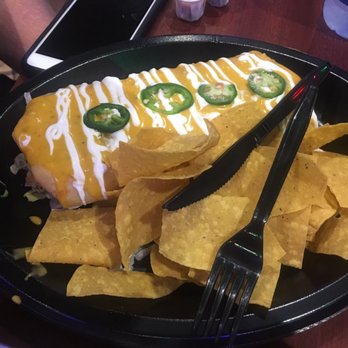 Tijuana Flats - Extra large burrito - Tex-Mex Near Me - Champions Gate, Florida Tijuana Flats - Extra large burrito - Tex-Mex Near Me - Champions Gate, Florida