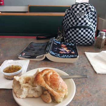 Baris Pasta & Pizza - This delicious roll is 50 cents for ONE!!!! Definitely get Bob sauce ( Super Flavored Olive Oil w/ garlic, red pepper flakes, Parm, etc.) - Pizza Near Me - Pflugerville, Texas