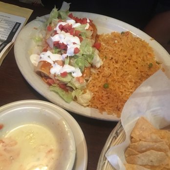 Cancun - Chicken enchiladas, red sauce , & rice $5.99 - Mexican Near Me - Lubbock, Texas
