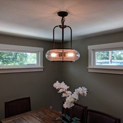 Panel Pros Electric - Beautiful chandelier to give your dining area a nice glow.