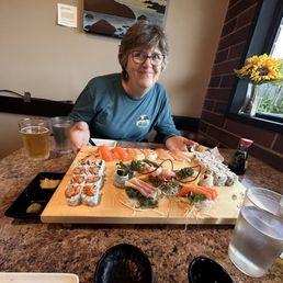 My wife finally gets enough sushi, but I made her share