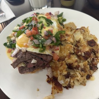 Lady C’s - Steak Benedict pot well added toppings of pico de gallo served with potatoes. - Breakfast & Brunch Near Me - Tarzana, California Lady C’s - Steak Benedict pot well added toppings of pico de gallo served with potatoes. - Breakfast & Brunch Near Me - Tarzana, California